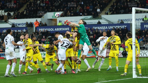270223 - Swansea City v Rotherham United, EFL Sky Bet Championship - Rotherham goalkeeper Viktor Johansson punches the ball clear