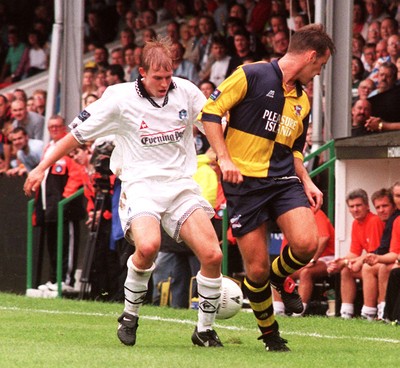 230897 - Swansea City v Scunthorpe - John Hills of Swansea is challenged by Michael Walsh