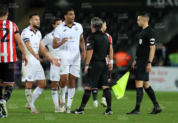 130922 - Swansea City v Sheffield United - SkyBet Championship - Ben Cabango of Swansea City speaks to the referee Darren Bond at full time