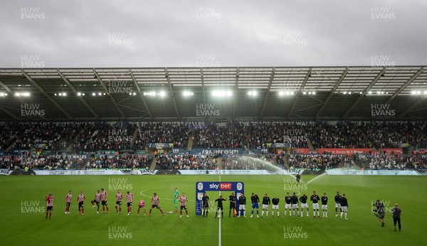 140821 - Swansea City v Sheffield United, EFL Sky Bet Championship - The teams walk out at the Swanseacom Stadium at the start of the match