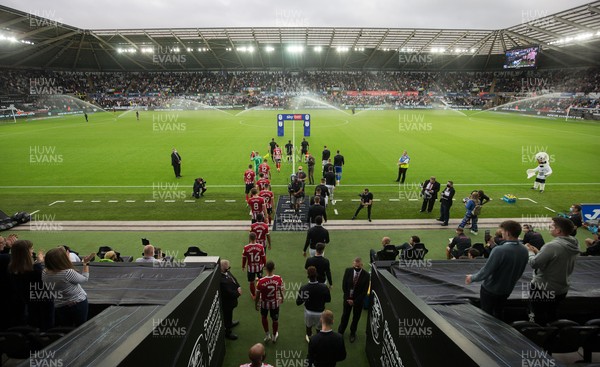 140821 - Swansea City v Sheffield United, EFL Sky Bet Championship - The teams walk out at the Swanseacom Stadium at the start of the match