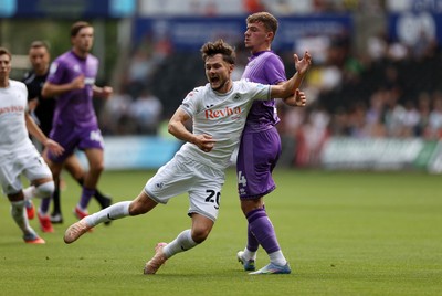 160825 - Swansea City v Sheffield United - SkyBet Championship - Liam Cullen of Swansea City is tackled by Harrison Burrows of Sheffield United 