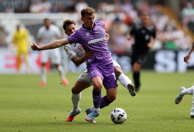 160825 - Swansea City v Sheffield United - SkyBet Championship - Harrison Burrows of Sheffield United is tackled by Goncalo Franco of Swansea City 