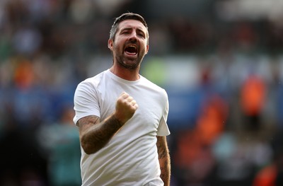 160825 - Swansea City v Sheffield United - SkyBet Championship - Swansea City Manager Alan Sheehan celebrates with fans at full time