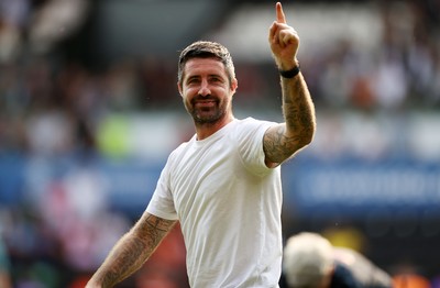 160825 - Swansea City v Sheffield United - SkyBet Championship - Swansea City Manager Alan Sheehan celebrates with fans at full time
