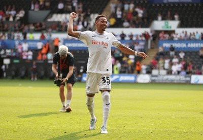 160825 - Swansea City v Sheffield United - SkyBet Championship - Ronald of Swansea City celebrates with fans at full time