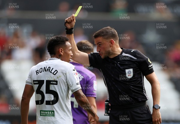 160825 - Swansea City v Sheffield United - SkyBet Championship - Ronald of Swansea City is given a yellow card by referee Thomas Kirk