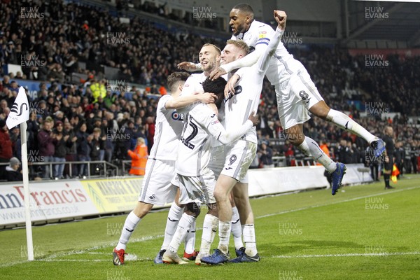 190119 - Swansea City v Sheffield United, EFL Championship - Oliver McBurnie of Swansea City (2nd right) celebrates scoring his side's first goal with team-mates