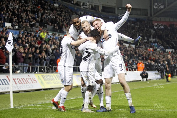 190119 - Swansea City v Sheffield United, EFL Championship - Oliver McBurnie of Swansea City (right) celebrates scoring his side's first goal with team-mates