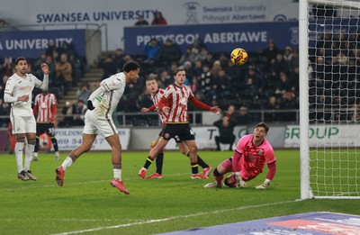 210125  Swansea City v Sheffield United, EFL Sky Bet Championship - Florian Bianchini of Swansea City heads to score the opening goal