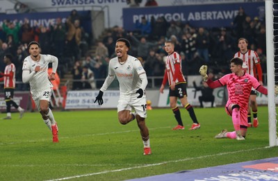 210125  Swansea City v Sheffield United, EFL Sky Bet Championship - Florian Bianchini of Swansea City celebrates after he heads to score the opening goal