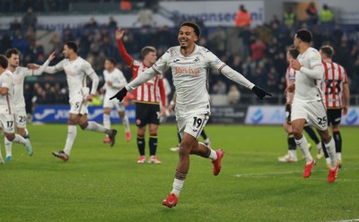 210125  Swansea City v Sheffield United, EFL Sky Bet Championship - Florian Bianchini of Swansea City celebrates after he heads to score the opening goal