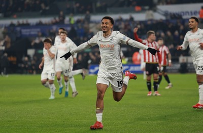 210125  Swansea City v Sheffield United, EFL Sky Bet Championship - Florian Bianchini of Swansea City celebrates after he heads to score the opening goal