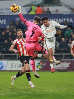 210125  Swansea City v Sheffield United, EFL Sky Bet Championship - Florian Bianchini of Swansea City is denied by Sheffield United goalkeeper Michael Cooper