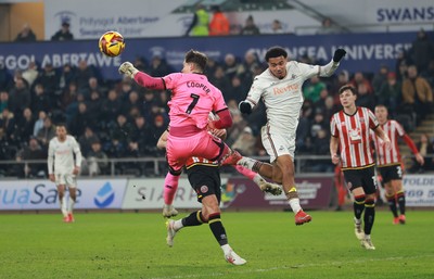 210125  Swansea City v Sheffield United, EFL Sky Bet Championship - Florian Bianchini of Swansea City is denied by Sheffield United goalkeeper Michael Cooper