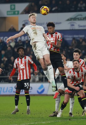 210125  Swansea City v Sheffield United, EFL Sky Bet Championship - Harry Darling of Swansea City heads at goal