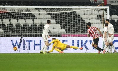 210125  Swansea City v Sheffield United, EFL Sky Bet Championship - Rhian Brewster of Sheffield United beats Swansea City goalkeeper Lawrence Vigouroux to score goal