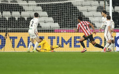 210125  Swansea City v Sheffield United, EFL Sky Bet Championship - Rhian Brewster of Sheffield United beats Swansea City goalkeeper Lawrence Vigouroux to score goal