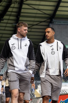 220826 - Swansea City v Sheffield United - Sky Bet Championship - Andy Fisher (L) and Adam Idah of Swansea City (R) arrive 