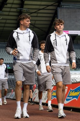 220826 - Swansea City v Sheffield United - Sky Bet Championship - Evan Watts (L) and Carter Heywood of Swansea City (R) arrives 