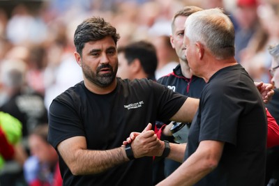 220826 - Swansea City v Sheffield United - Sky Bet Championship - Vítor Matos Manager of Swansea City (L) greets Chris Wilder  Manager of Sheffield United (R) 
