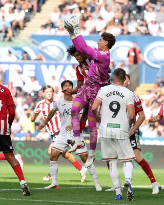 220826 - Swansea City v Sheffield United - Sky Bet Championship - Michael Cooper of Sheffield United collects the ball