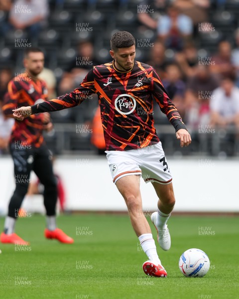 220826 - Swansea City v Sheffield United - Sky Bet Championship - Ross Stewart of Swansea City warms up