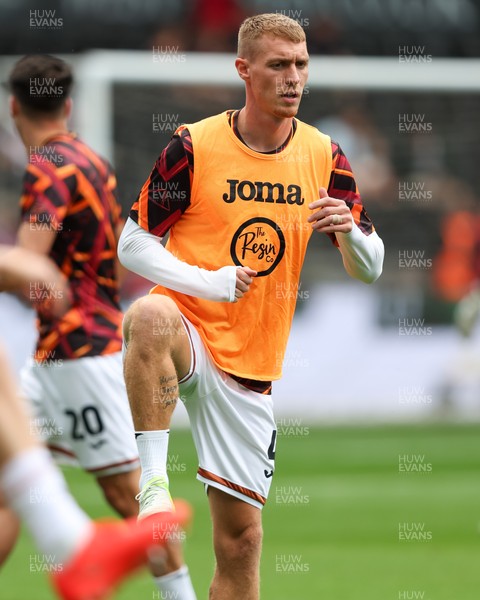 220826 - Swansea City v Sheffield United - Sky Bet Championship - Jay Fulton of Swansea City warms up