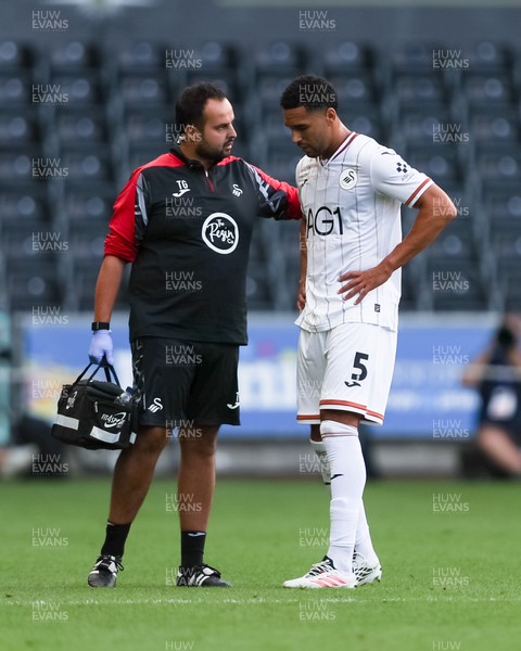 220826 - Swansea City v Sheffield United - Sky Bet Championship - Ben Cabango of Swansea City goes off injured 