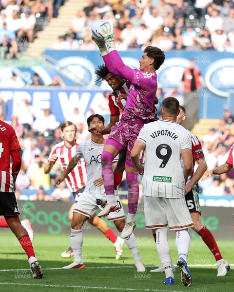 220826 - Swansea City v Sheffield United - Sky Bet Championship - Michael Cooper of Sheffield United collects the ball