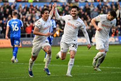 080226 - Swansea City v Sheffield Wednesday - Sky Bet Championship - Goncalo Franco of Swansea City celebrates scoring a goal with team mates