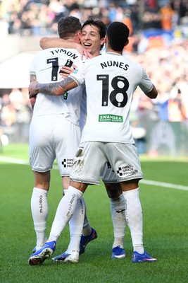 080226 - Swansea City v Sheffield Wednesday - Sky Bet Championship - Goncalo Franco of Swansea City celebrates scoring a goal with team mates
