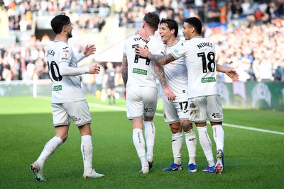 080226 - Swansea City v Sheffield Wednesday - Sky Bet Championship - Goncalo Franco of Swansea City celebrates scoring a goal with team mates