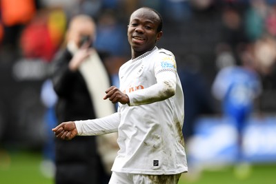 080226 - Swansea City v Sheffield Wednesday - Sky Bet Championship - Malick Yalcouye of Swansea City celebrates the win at full time