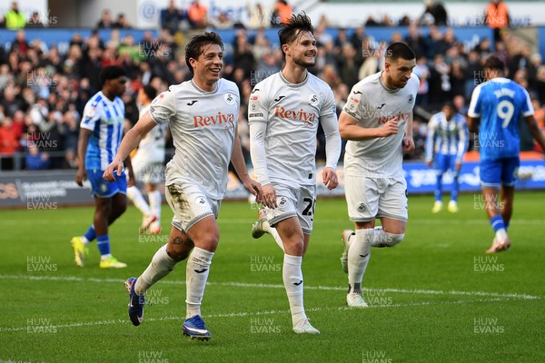080226 - Swansea City v Sheffield Wednesday - Sky Bet Championship - Goncalo Franco of Swansea City celebrates scoring a goal with team mates