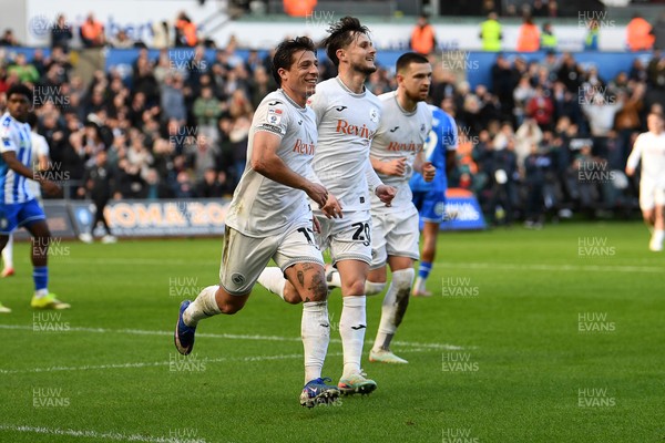 080226 - Swansea City v Sheffield Wednesday - Sky Bet Championship - Goncalo Franco of Swansea City celebrates scoring a goal with team mates
