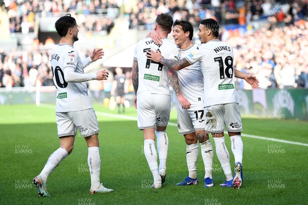 080226 - Swansea City v Sheffield Wednesday - Sky Bet Championship - Goncalo Franco of Swansea City celebrates scoring a goal with team mates