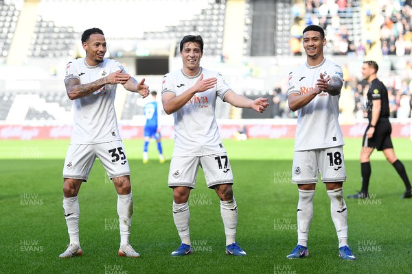 080226 - Swansea City v Sheffield Wednesday - Sky Bet Championship - Goncalo Franco of Swansea City celebrates scoring a goal with Ronald (left) and Gustavo Nunes (right0