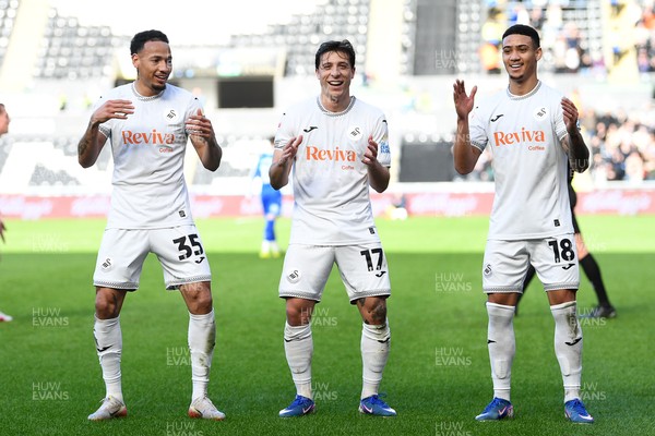 080226 - Swansea City v Sheffield Wednesday - Sky Bet Championship - Goncalo Franco of Swansea City celebrates scoring a goal with Ronald (left) and Gustavo Nunes (right0