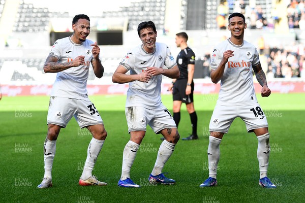 080226 - Swansea City v Sheffield Wednesday - Sky Bet Championship - Goncalo Franco of Swansea City celebrates scoring a goal with Ronald (left) and Gustavo Nunes (right0