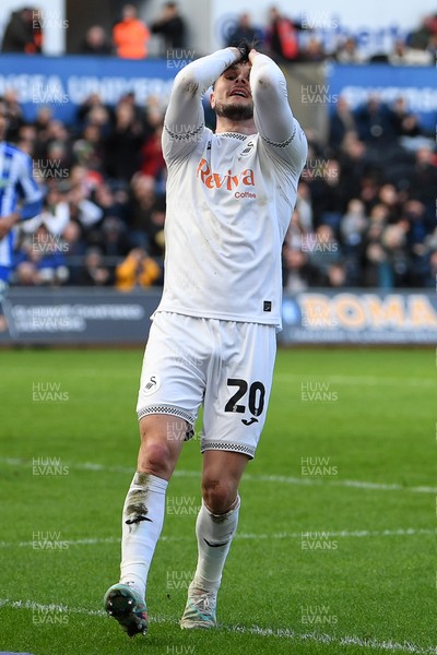 080226 - Swansea City v Sheffield Wednesday - Sky Bet Championship - Liam Cullen of Swansea City hits the bar in his attempt to lob the keeper