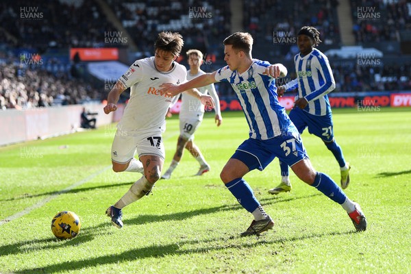 080226 - Swansea City v Sheffield Wednesday - Sky Bet Championship - Goncalo Franco of Swansea City is challenged by Jarvis Thornton of Sheffield Wednesday
