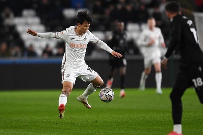 120225 - Swansea City v Sheffield Wednesday - Sky Bet Championship - Eom Ji-Sung of Swansea City controls the ball