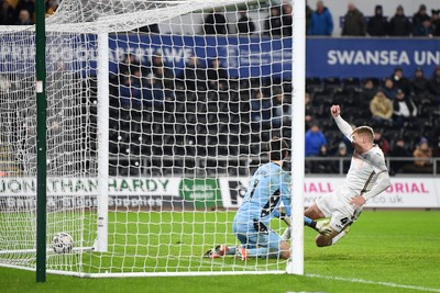 120225 - Swansea City v Sheffield Wednesday - Sky Bet Championship - Jay Fulton of Swansea City scores in the last kick of the game but it is ruled offside