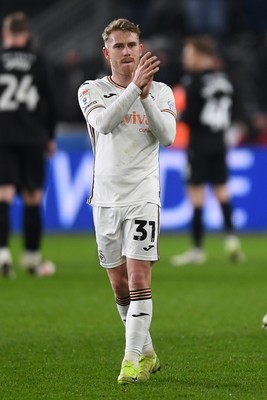 120225 - Swansea City v Sheffield Wednesday - Sky Bet Championship - Ollie Cooper of Swansea City looking dejected at full time