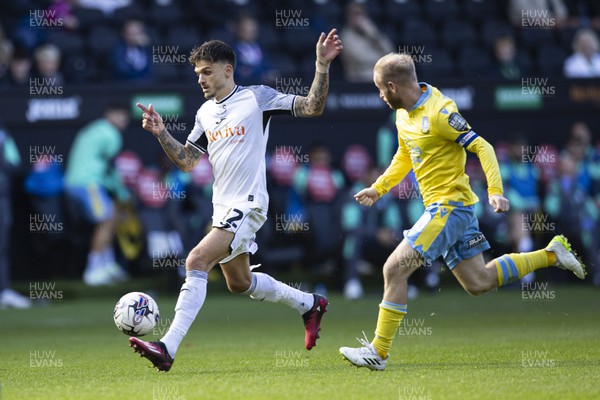 230923 - Swansea City v Sheffield Wednesday - Sky Bet Championship - Jamie Paterson of Swansea City in action against Barry Bannan of Sheffield Wednesday