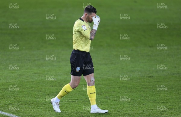 251120 - Swansea City v Sheffield Wednesday, Sky Bet Championship - Sheffield Wednesday goalkeeper Keiren Westwood is forced to leave the pitch with an injury