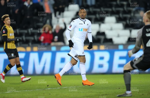 270218 - Swansea City v Sheffield Wednesday, FA Cup Fifth Round Replay - Jordan Ayew of Swansea City wheels away to celebrate after scoring goal