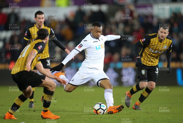 270218 - Swansea City v Sheffield Wednesday, FA Cup Fifth Round Replay - Jordan Ayew of Swansea City fires as hot at goal