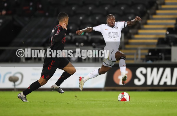 080122 - Swansea City v Southampton, FA Cup - Michael Obafemi of Swansea City is challenged by Yan Valery of Southampton resulting in Valery being shown a red card